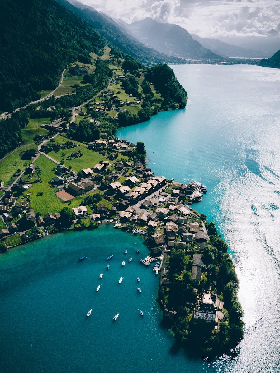 bird's eye view photography of boat on body of water