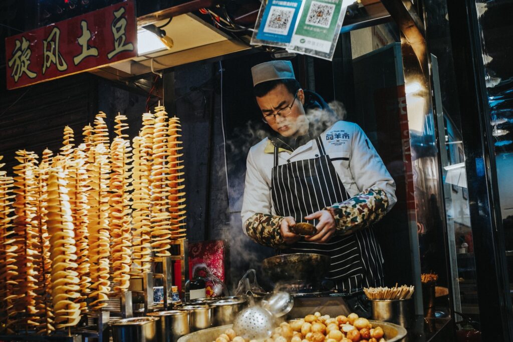 man frying potato Xi'an