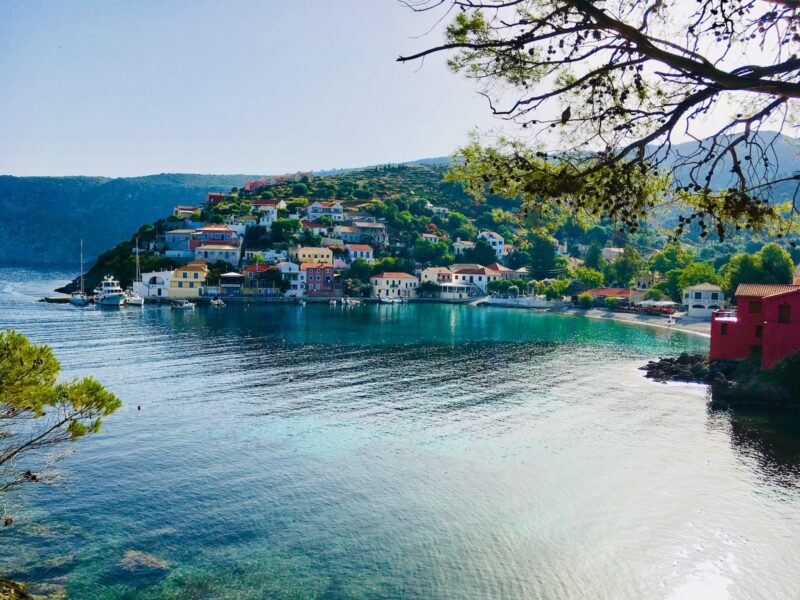 houses near body of water during daytime