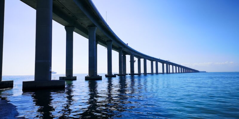 white concrete bridge over water