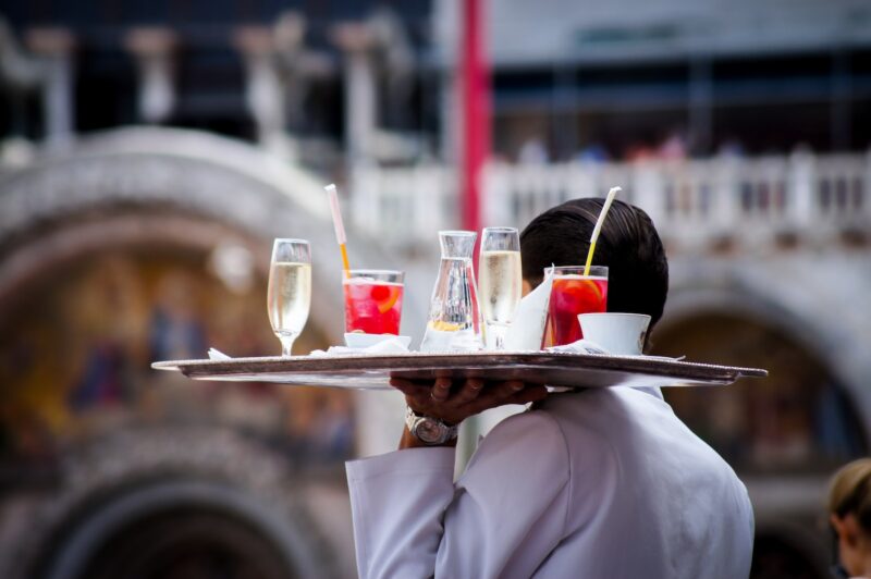 waiter serving beverages