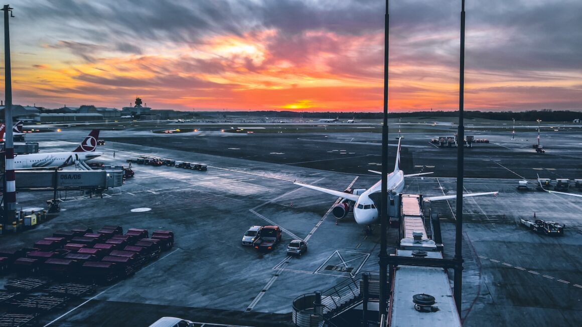 a large jetliner sitting on top of an airport tarmac