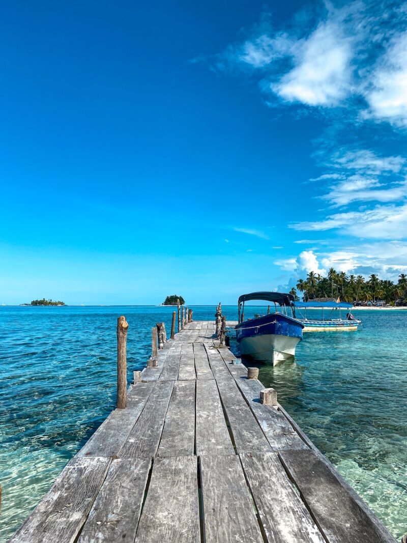 a dock leading to a boat