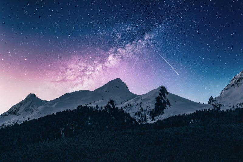 snow mountain under stars