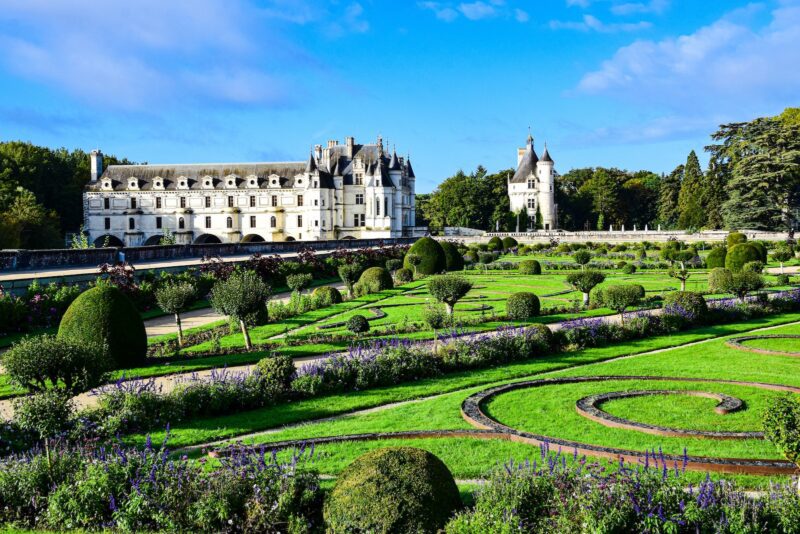 A European castle with a beautiful lawn