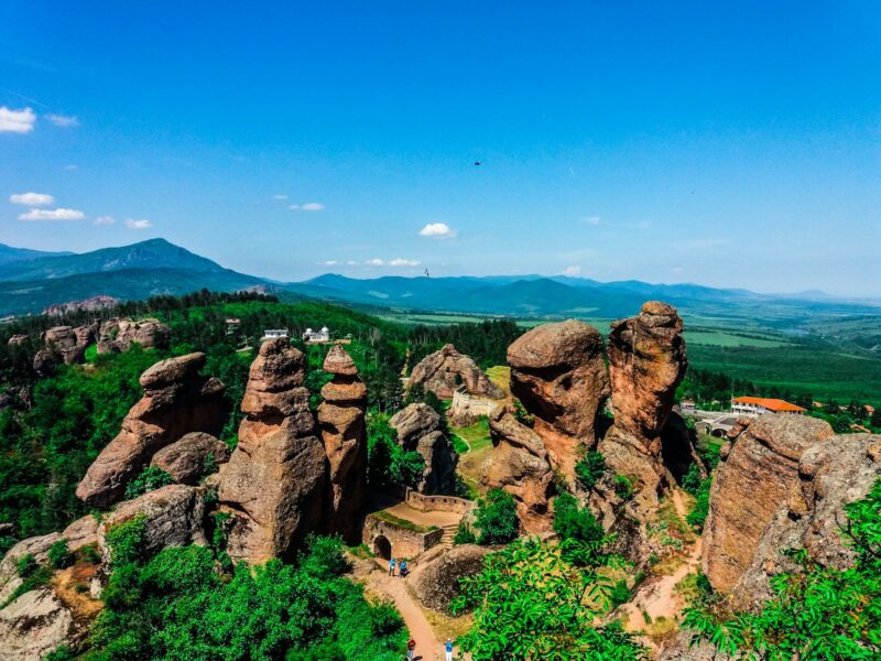 brown rock formation under blue sky during daytime