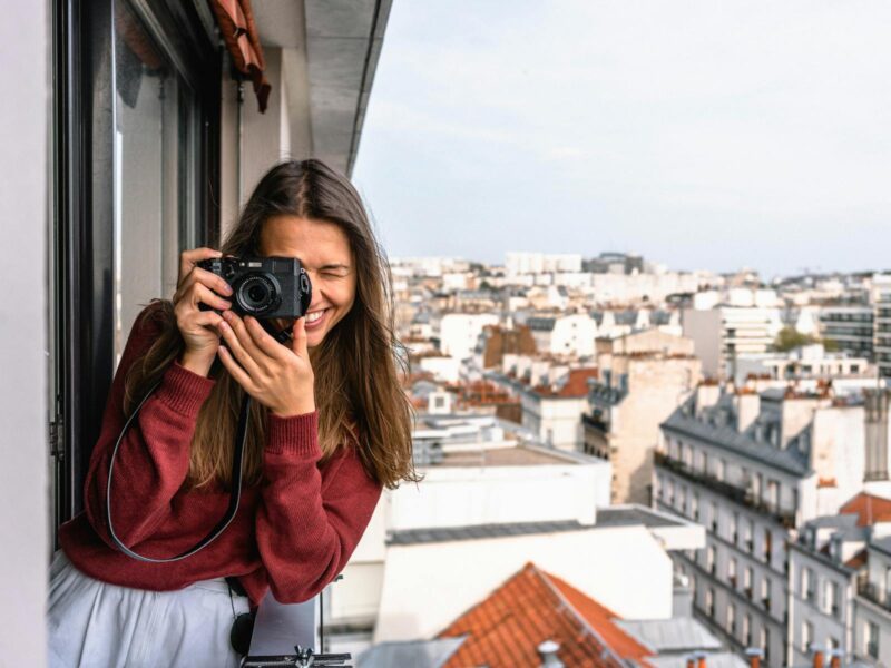 woman holding a camera