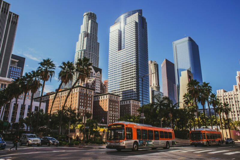 bus on road near building at daytime