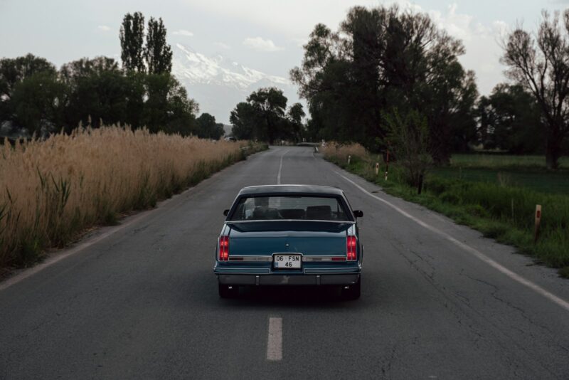 a car is parked on the side of the road