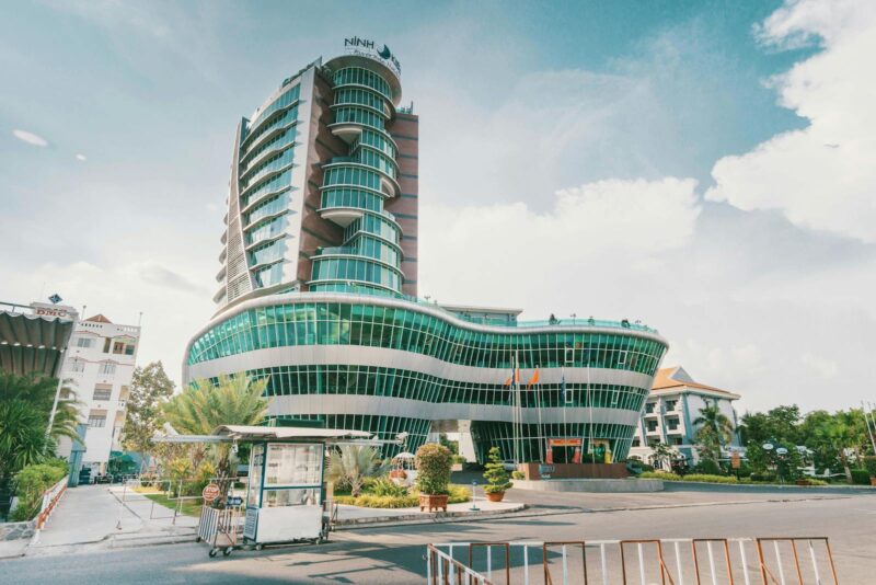 High Rise Building With Green Glass Windows